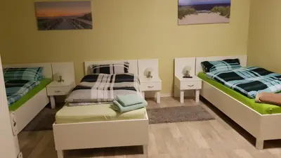 Ein Bett oder Betten in einem Zimmer der Unterkunft Pension Dreger