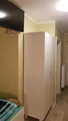 Ein Bett oder Betten in einem Zimmer der Unterkunft Pension Dreger
