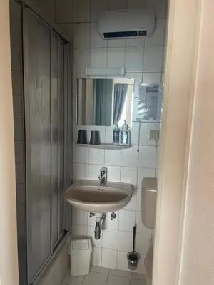 Ein Badezimmer in der Unterkunft Hotel Berghof