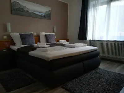 Ein Bett oder Betten in einem Zimmer der Unterkunft Hotel Ari