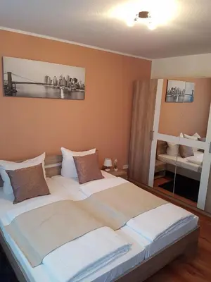 Ein Bett oder Betten in einem Zimmer der Unterkunft Hotel Ari