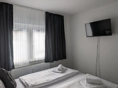 Ein Bett oder Betten in einem Zimmer der Unterkunft Hotel Ari