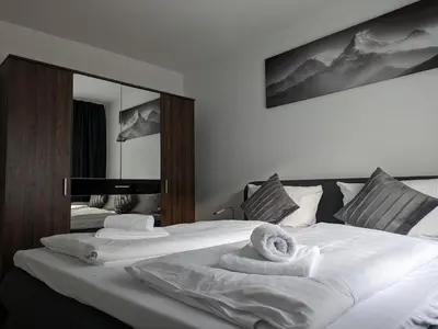 Ein Bett oder Betten in einem Zimmer der Unterkunft Hotel Ari