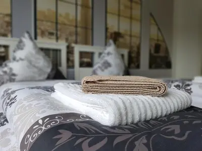 Ein Bett oder Betten in einem Zimmer der Unterkunft FeWo Lingenfeld
