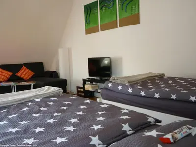 Ein Bett oder Betten in einem Zimmer der Unterkunft Domizil Domblick Speyer City, Garage, 50m2