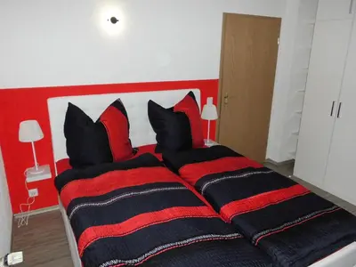 Ein Bett oder Betten in einem Zimmer der Unterkunft Ferienwohnung Schwalbennest