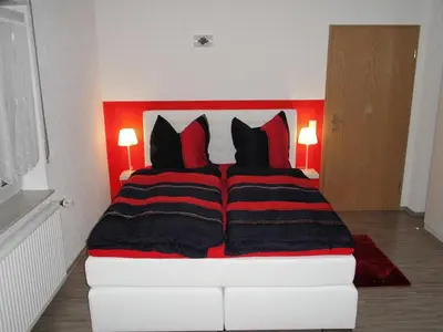 Ein Bett oder Betten in einem Zimmer der Unterkunft Ferienwohnung Schwalbennest