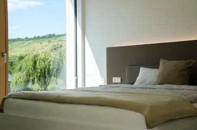 Ein Bett oder Betten in einem Zimmer der Unterkunft Lumina Apartments