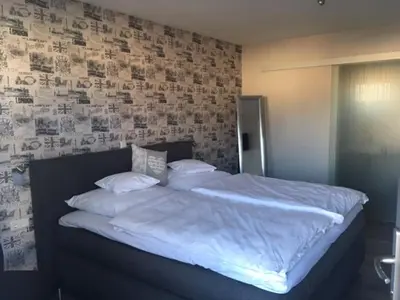 Ein Bett oder Betten in einem Zimmer der Unterkunft Boardinghouse Alte Bank