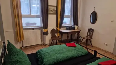 Ein Bett oder Betten in einem Zimmer der Unterkunft Pension Jeske Heidelberg