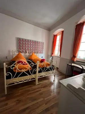 Ein Bett oder Betten in einem Zimmer der Unterkunft Pension Jeske Heidelberg
