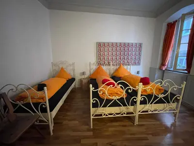 Ein Bett oder Betten in einem Zimmer der Unterkunft Pension Jeske Heidelberg