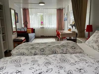 Ein Bett oder Betten in einem Zimmer der Unterkunft Am Berggarten