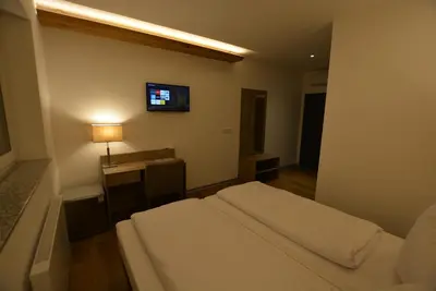 Ein Bett oder Betten in einem Zimmer der Unterkunft GS DiePension