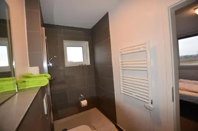 Ein Badezimmer in der Unterkunft GS DiePension
