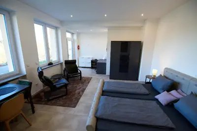 Ein Sitzbereich in der Unterkunft Business Apartments Höfle