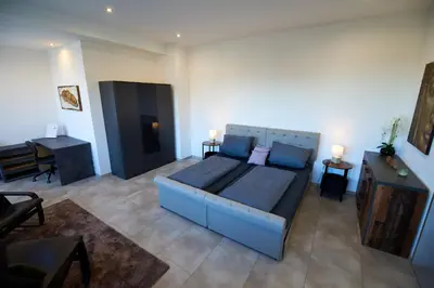 Ein Sitzbereich in der Unterkunft Business Apartments Höfle