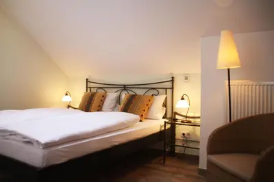 Ein Bett oder Betten in einem Zimmer der Unterkunft Porta Vinea