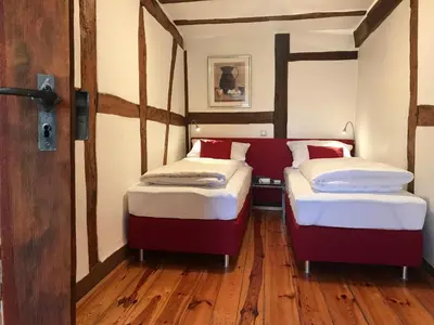 Ein Bett oder Betten in einem Zimmer der Unterkunft Boarding House Obernburg