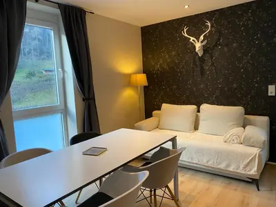 Ein Sitzbereich in der Unterkunft Apartment End