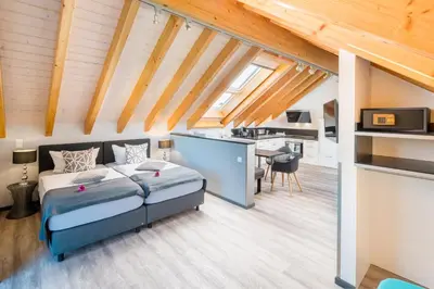 Ein Bett oder Betten in einem Zimmer der Unterkunft Design-Apartments by Ulrike Horster