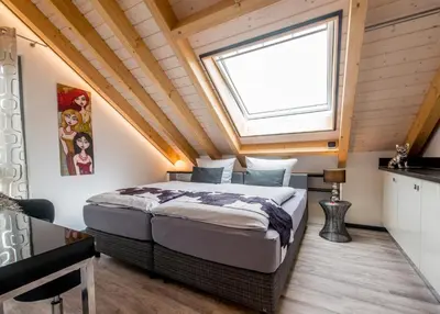 Ein Bett oder Betten in einem Zimmer der Unterkunft Design-Apartments by Ulrike Horster
