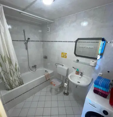 Ein Badezimmer in der Unterkunft SoNi Apartment