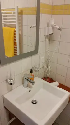 Ein Badezimmer in der Unterkunft Ellenbergs Restaurant & Hotel