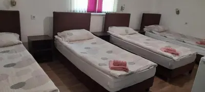 Ein Bett oder Betten in einem Zimmer der Unterkunft Pension Haus Baron 2 Friedrichsfeld