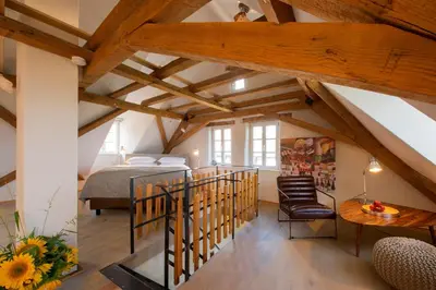 Ein Bett oder Betten in einem Zimmer der Unterkunft Burggarten Appartements Neuleiningen