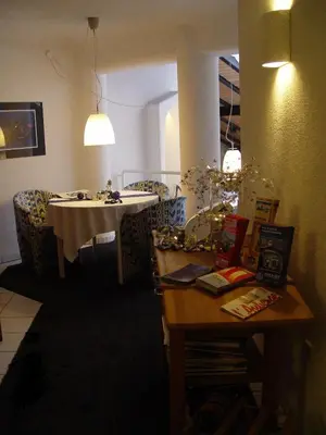 Ein Sitzbereich in der Unterkunft L'Auberge