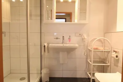 Ein Badezimmer in der Unterkunft Pension zur Weinlaube