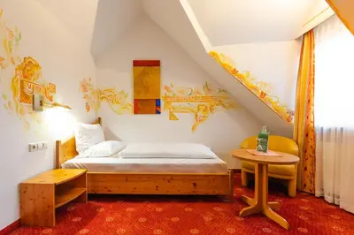 Ein Bett oder Betten in einem Zimmer der Unterkunft ALLVITALIS Traumhotel