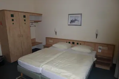 Ein Bett oder Betten in einem Zimmer der Unterkunft Hotel Ring Park
