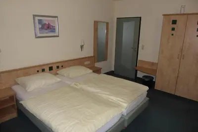 Ein Bett oder Betten in einem Zimmer der Unterkunft Hotel Ring Park