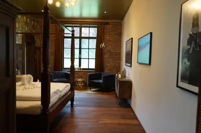 Ein Bett oder Betten in einem Zimmer der Unterkunft Hofgut Holzmuhle