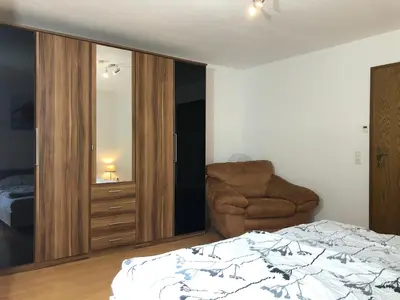 Ein Bett oder Betten in einem Zimmer der Unterkunft Ferienwohnung Familie Hinrichs