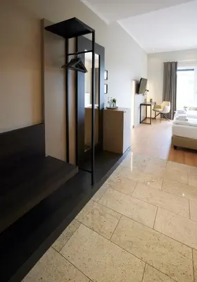 Ein Bett oder Betten in einem Zimmer der Unterkunft Hotel Soho
