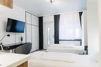Ein Bett oder Betten in einem Zimmer der Unterkunft Apartment in Innenstadtnähe