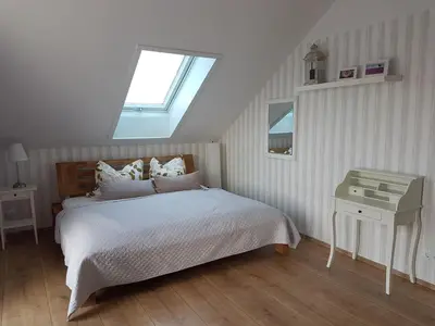 Ein Bett oder Betten in einem Zimmer der Unterkunft Ferienwohnung Grewe
