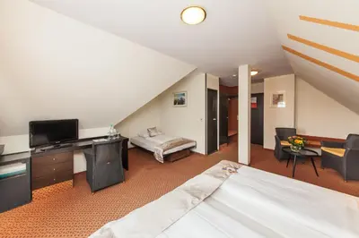 Ein Bett oder Betten in einem Zimmer der Unterkunft Hotel Strohgäu