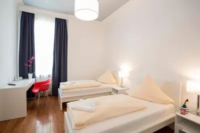 Ein Bett oder Betten in einem Zimmer der Unterkunft Hotel Mille Stelle City
