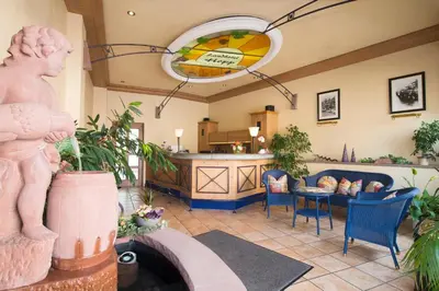 Ein Sitzbereich in der Unterkunft Landhotel Hopp Garni