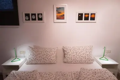 Ein Bett oder Betten in einem Zimmer der Unterkunft Ina's Ferienwohnung