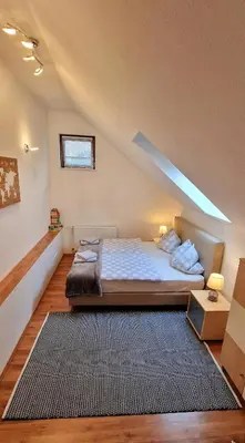 Ein Bett oder Betten in einem Zimmer der Unterkunft Privatwohnung Rybczynski