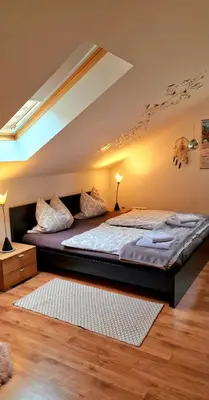 Ein Bett oder Betten in einem Zimmer der Unterkunft Privatwohnung Rybczynski