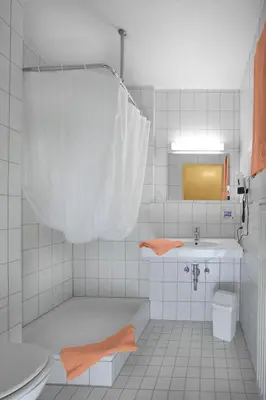 Ein Badezimmer in der Unterkunft Hotel Weissach Am Neuenbühl