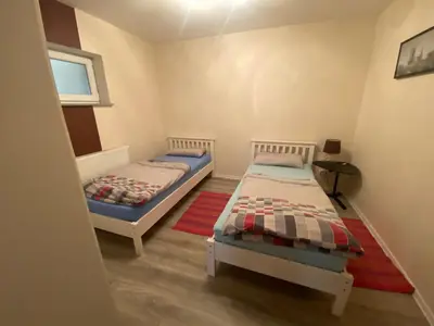 Ein Bett oder Betten in einem Zimmer der Unterkunft Ferienwohnung - Monteurwohnung Familie Houri