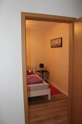 Ein Bett oder Betten in einem Zimmer der Unterkunft Ferienwohnung - Monteurwohnung Familie Houri