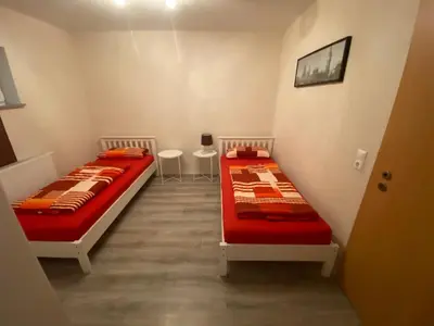 Ein Bett oder Betten in einem Zimmer der Unterkunft Ferienwohnung - Monteurwohnung Familie Houri